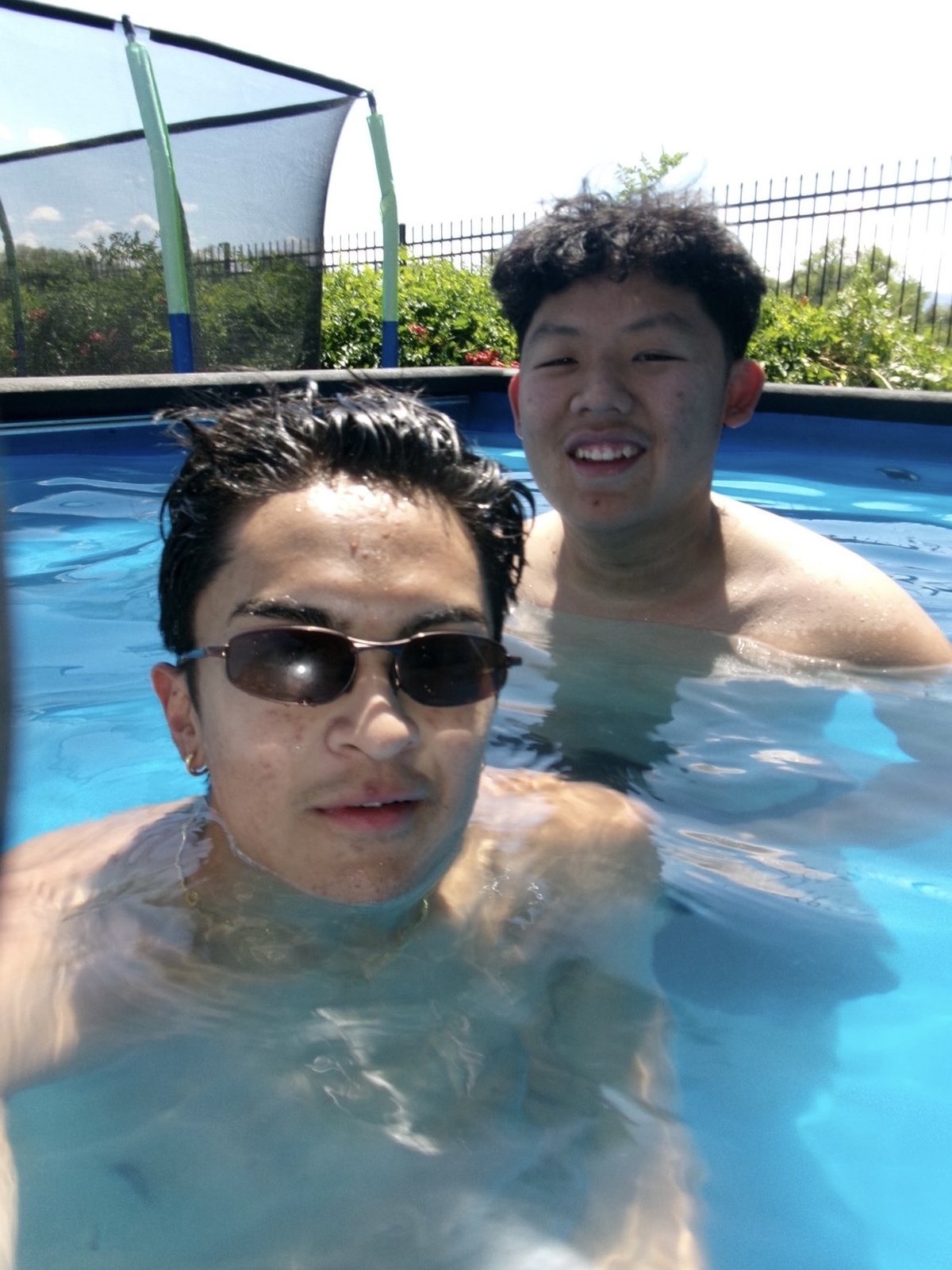 Ratanon and a friend in a pool
