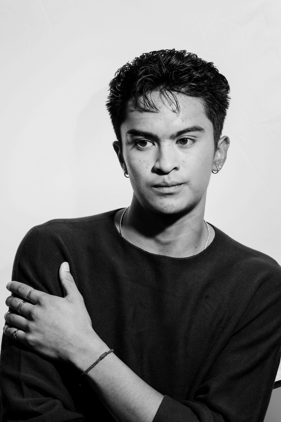 Ratanon, black and white studio portrait, three-quarter turn