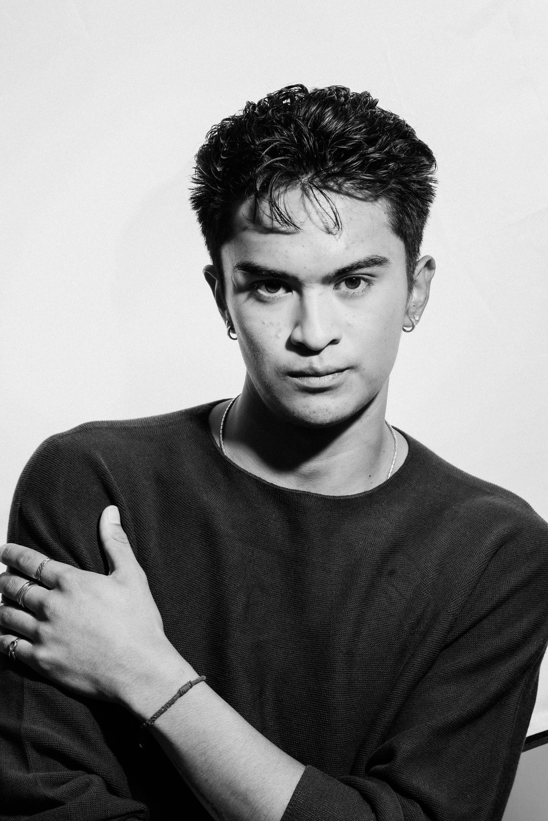 Ratanon, black and white studio portrait, direct gaze